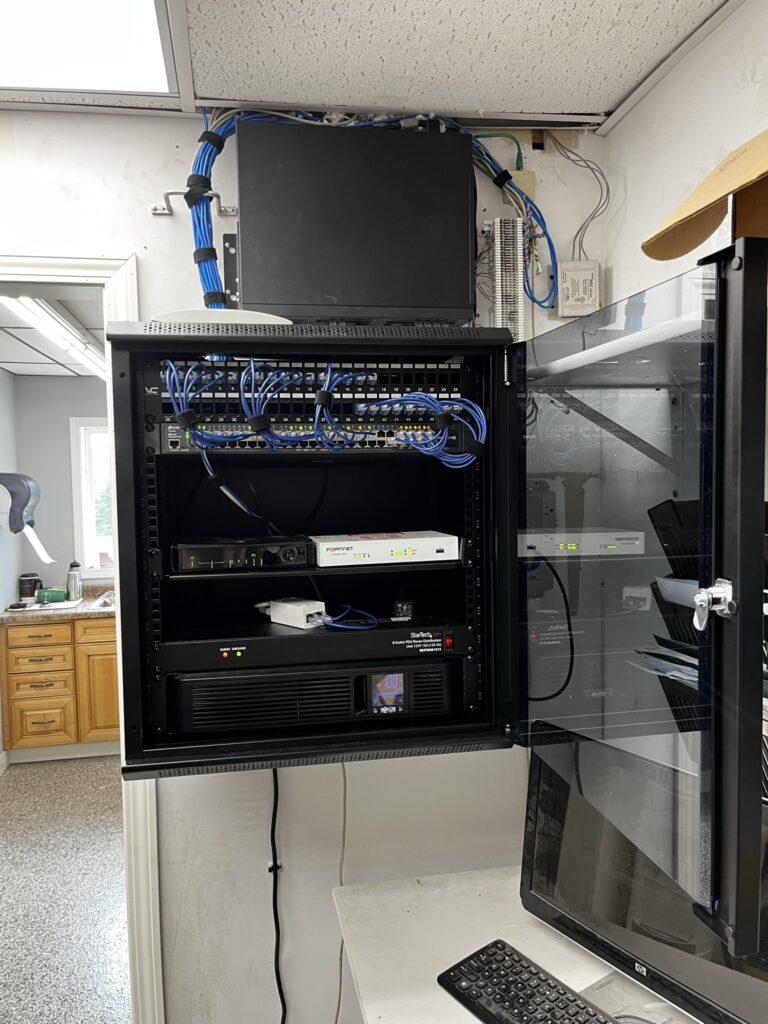 Data networking and Wi-Fi equipment in a network rack.